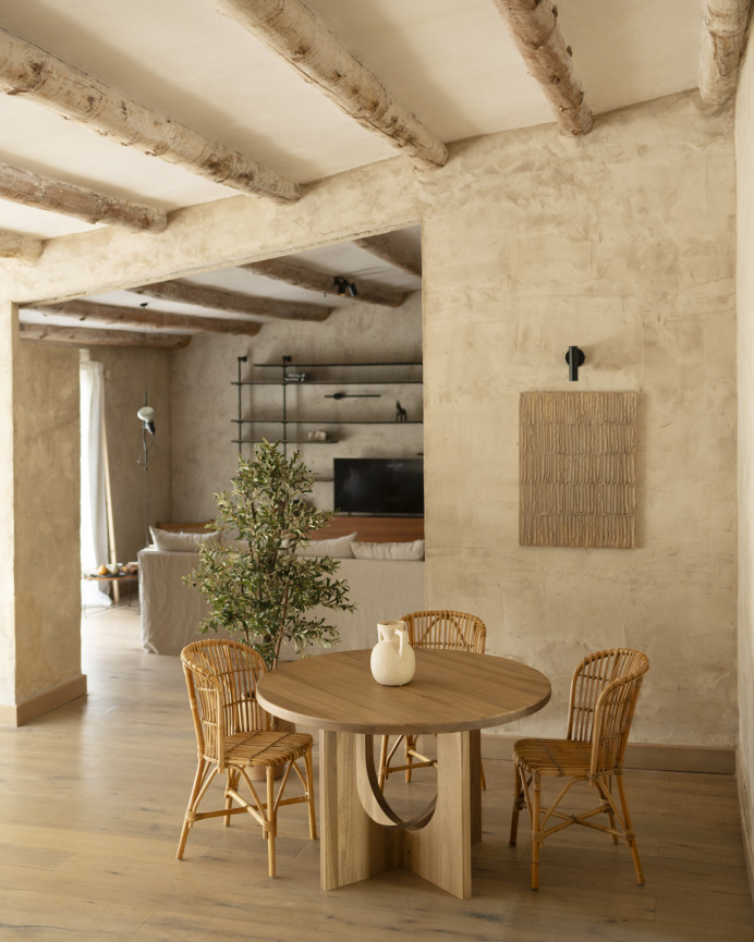 Round dining table made of solid poplar wood in various sizes.