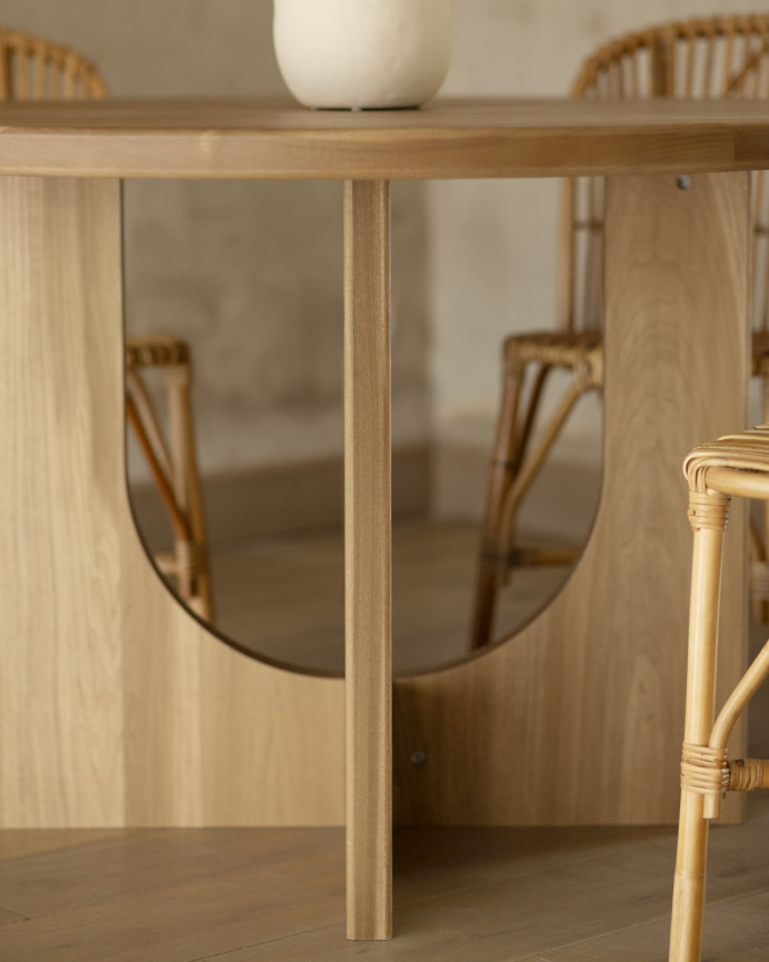 Round dining table made of solid poplar wood in various sizes.