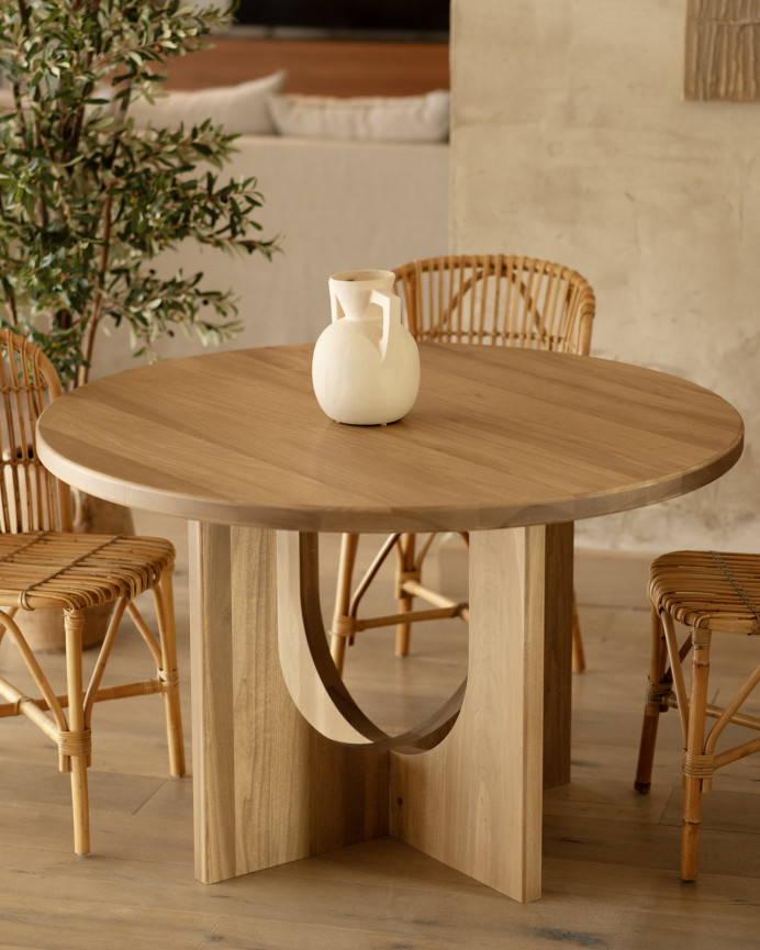 Round dining table made of solid poplar wood in various sizes.