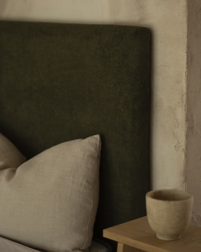 Upholstered headboard in green color of various sizes.
