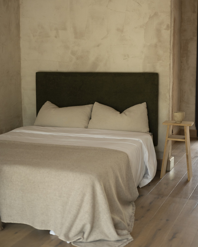 Upholstered headboard in green color of various sizes.