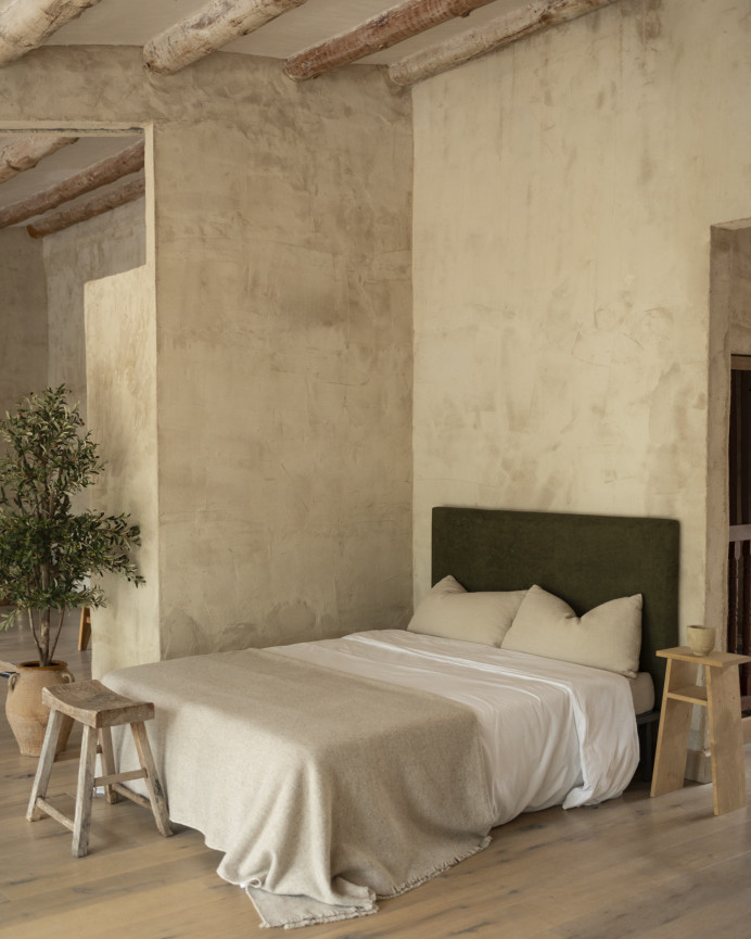 Upholstered headboard in green color of various sizes.