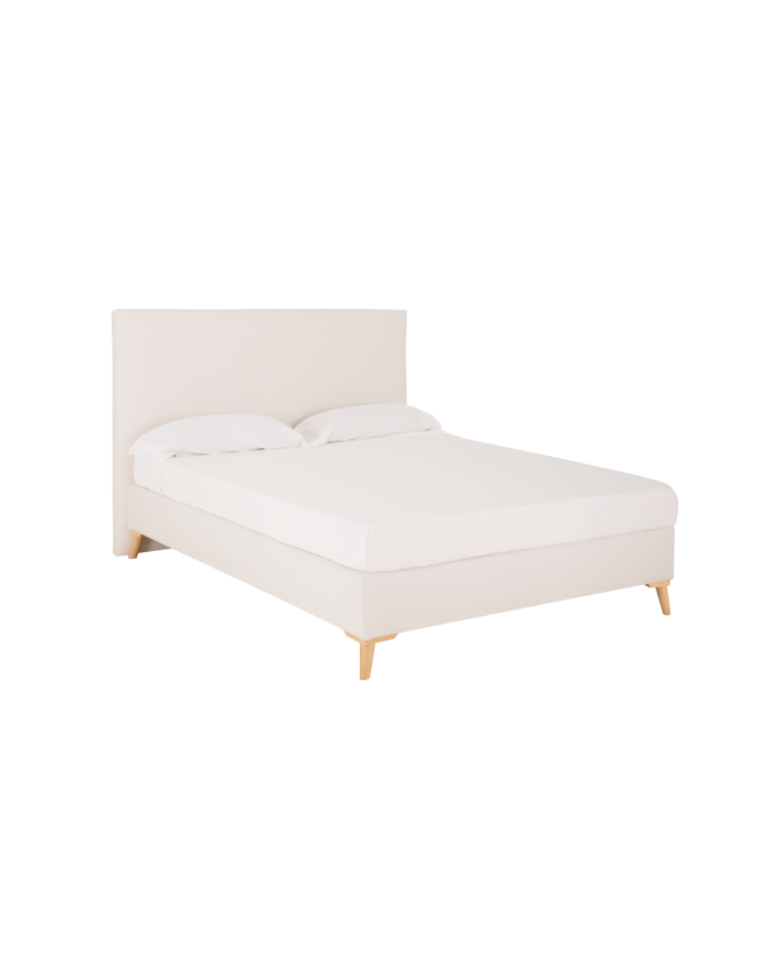 Upholstered bed covered in white linen for a mattress of various sizes