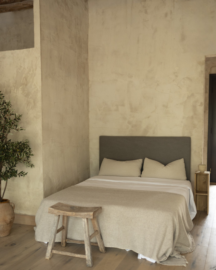 Upholstered headboard in dark gray color in various measurements.