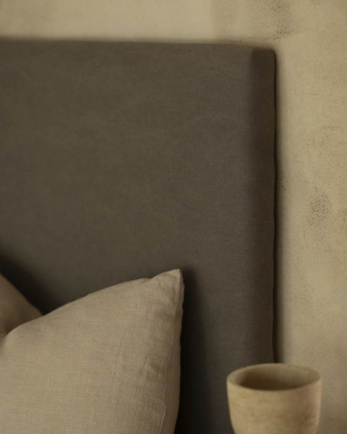 Upholstered headboard in dark gray color in various measurements.
