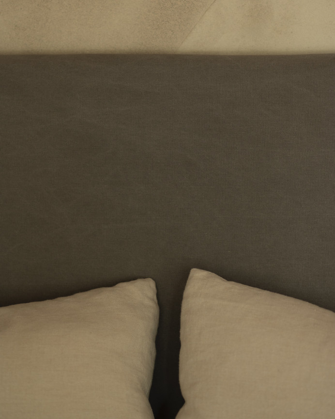 Upholstered headboard in dark gray color in various measurements.