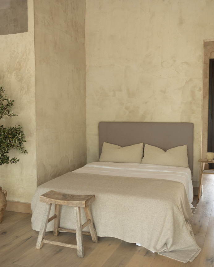Upholstered headboard in brown color available in various sizes.
