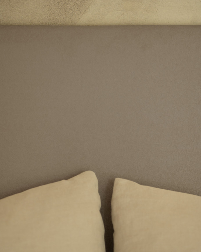 Upholstered headboard in brown color available in various sizes.