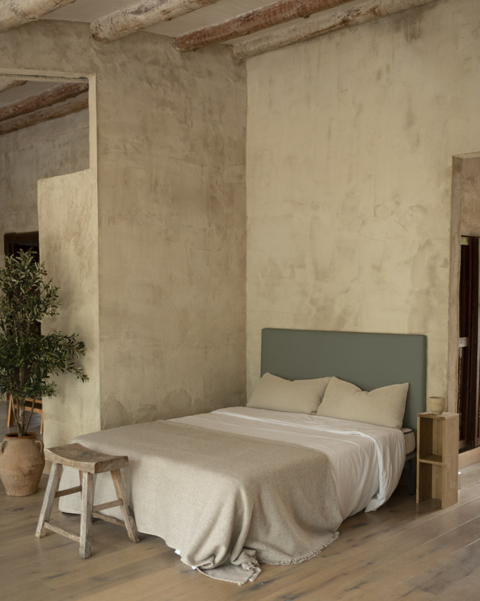 Upholstered headboard in green color available in various sizes