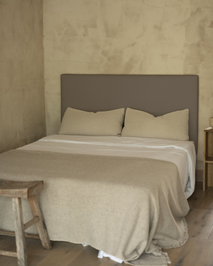 Upholstered headboard in brown color in various sizes.