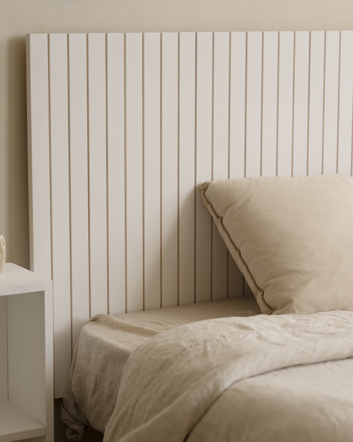 Slotted solid wood headboard in white tone available in various sizes.