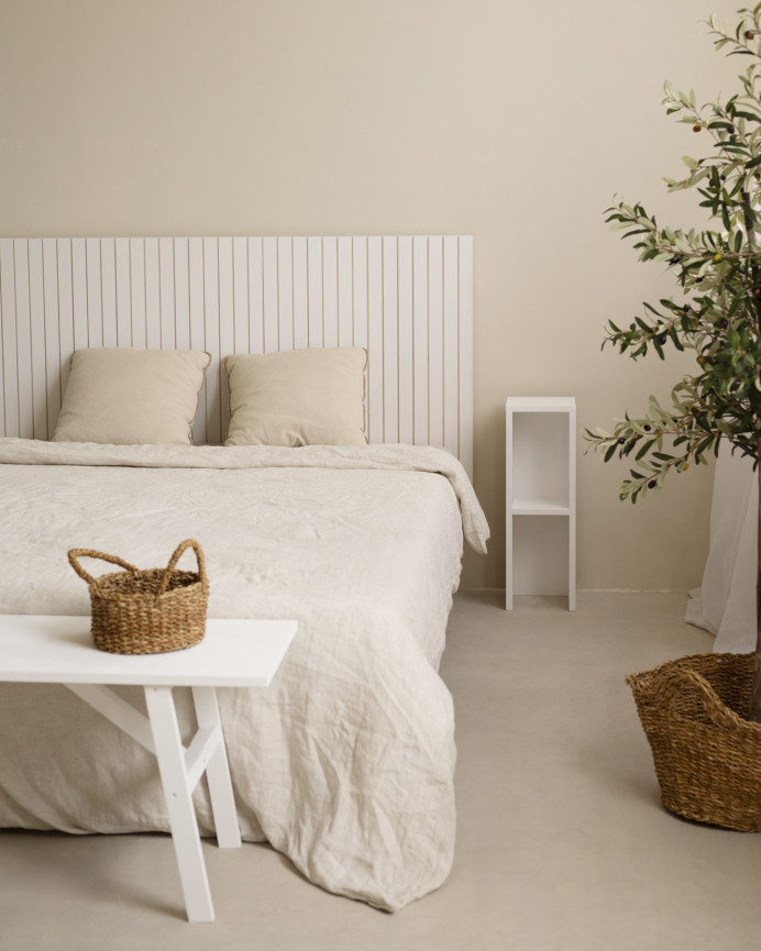 Slotted solid wood headboard in white tone available in various sizes.