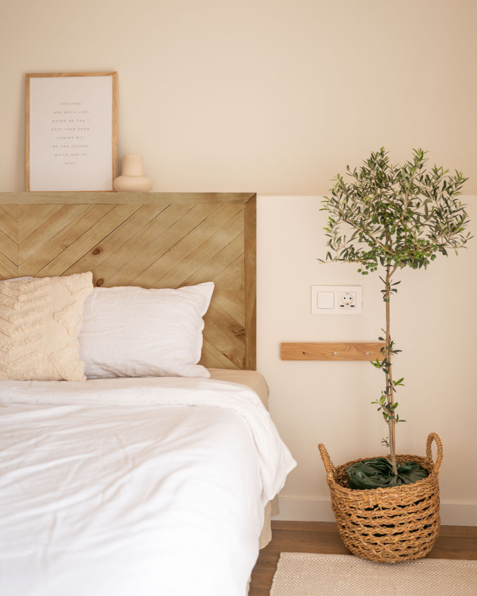 Solid wood ethnic style headboard in dark oak tone measuring 80x165cm.