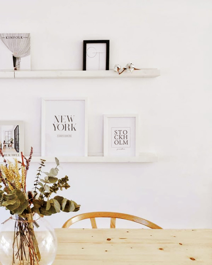Solid wood floating shelf in white tone, available in various sizes.