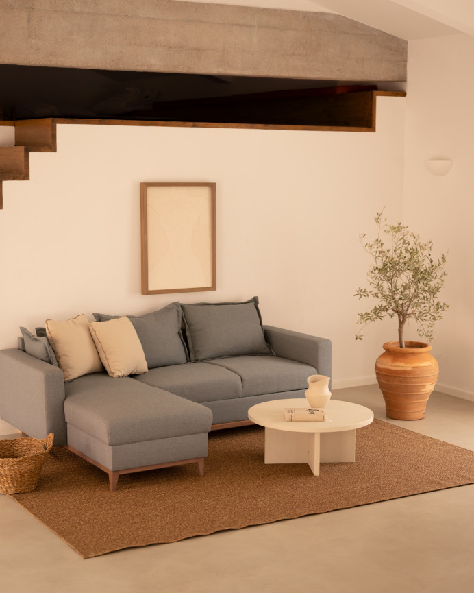 Round microcement coffee table in off-white shade available in various sizes.