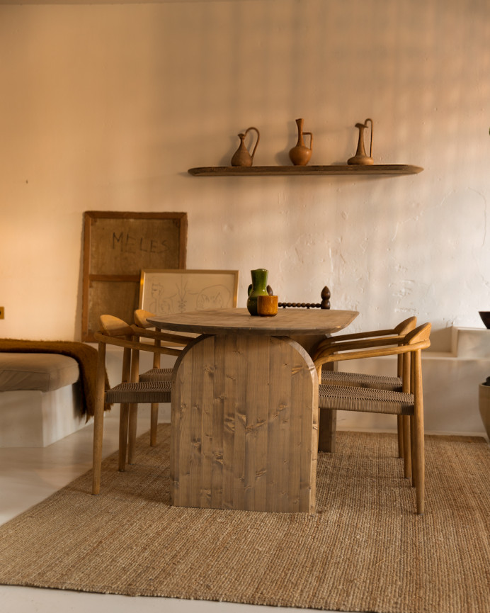 Oval solid wood dining table in dark oak tone of various sizes.