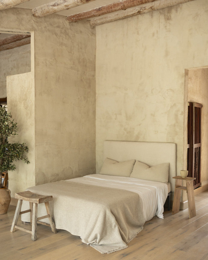 Upholstered headboard in off-white color available in various sizes.