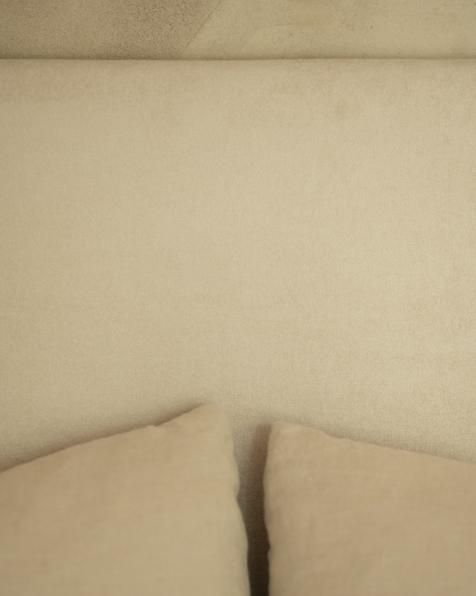 Upholstered headboard in off-white color available in various sizes.