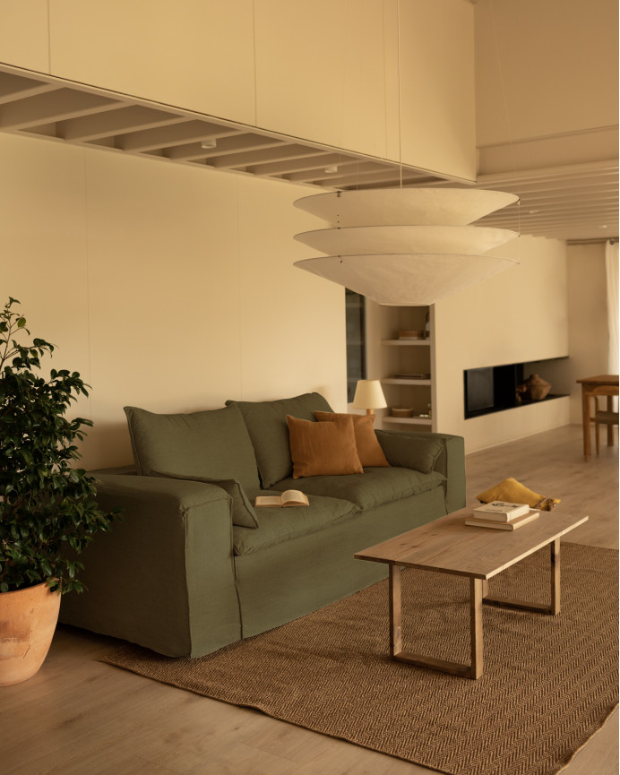 Removable linen sofa cover in green available in various sizes.