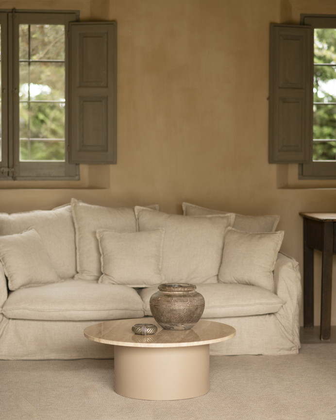 Round travertine marble coffee table with beige micro cement legs, measuring 80x32cm.