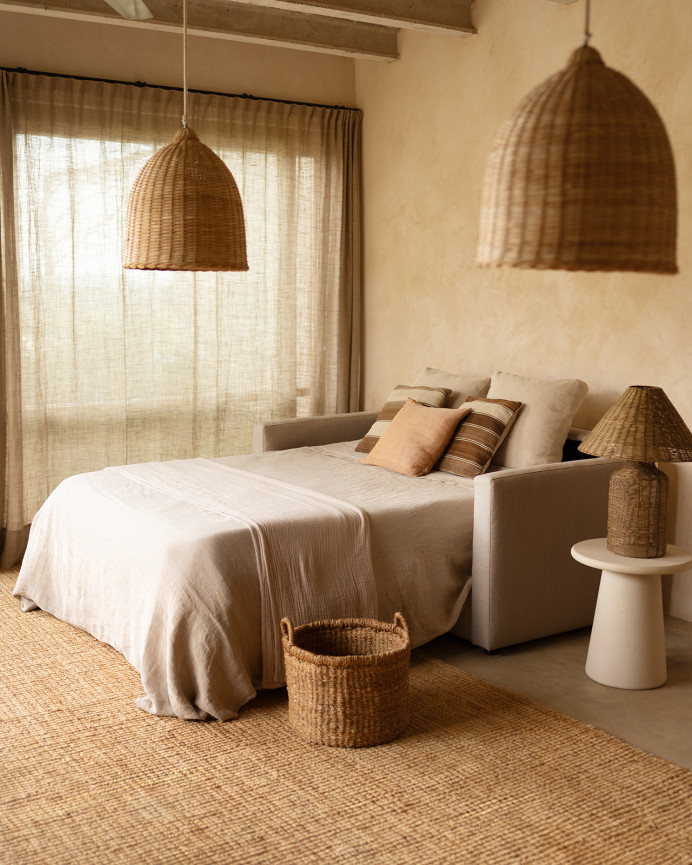Beige sofa bed with dimensions of 185x95cm.