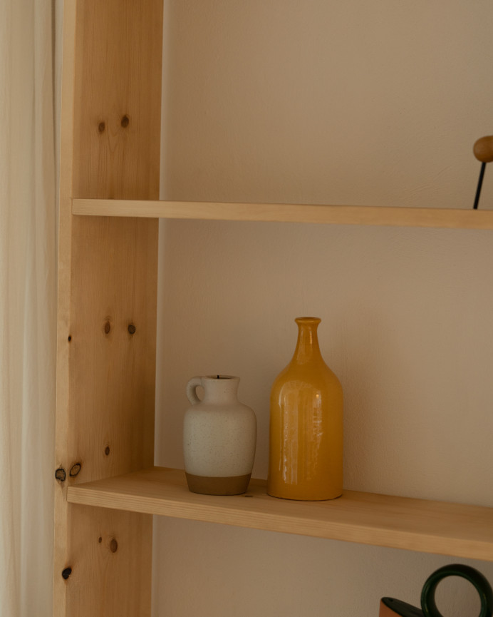 Solid oak wood shelf in medium oak tone with 4 shelves.