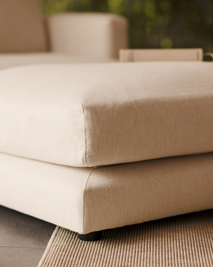 Roughly translating this from Spanish to English, it means:"Rough, broken white pouf of 97x78cm"