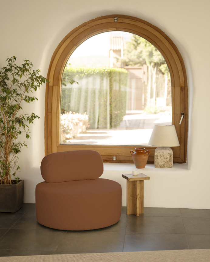 Round brown copper bouclé armchair measuring 91x71cm.