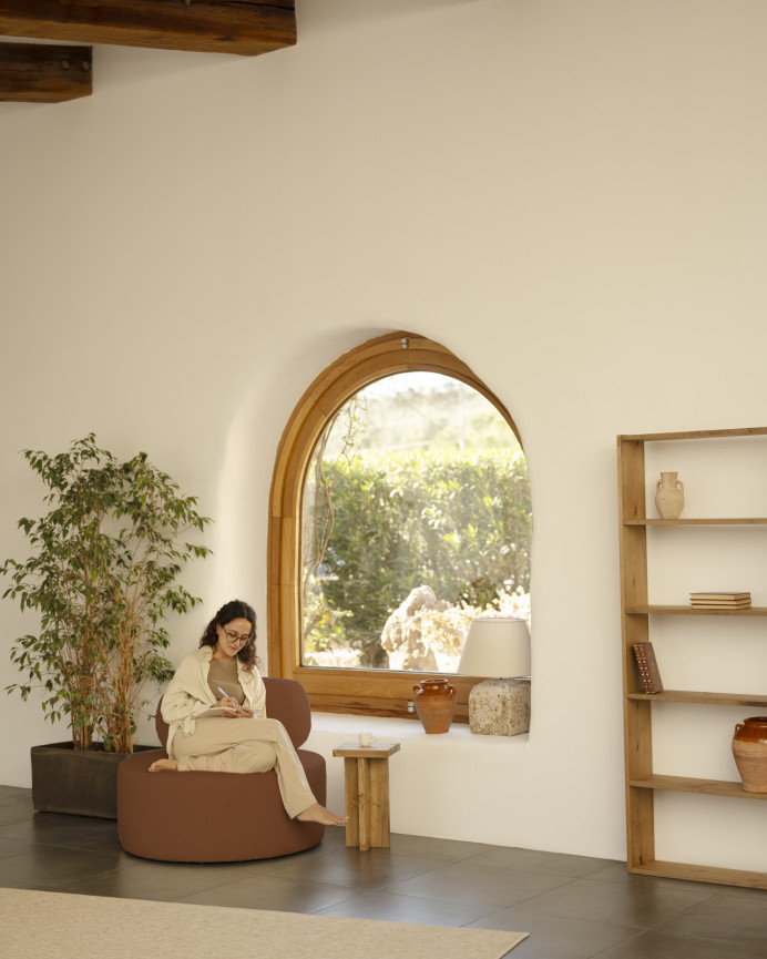 Round brown copper bouclé armchair measuring 91x71cm.