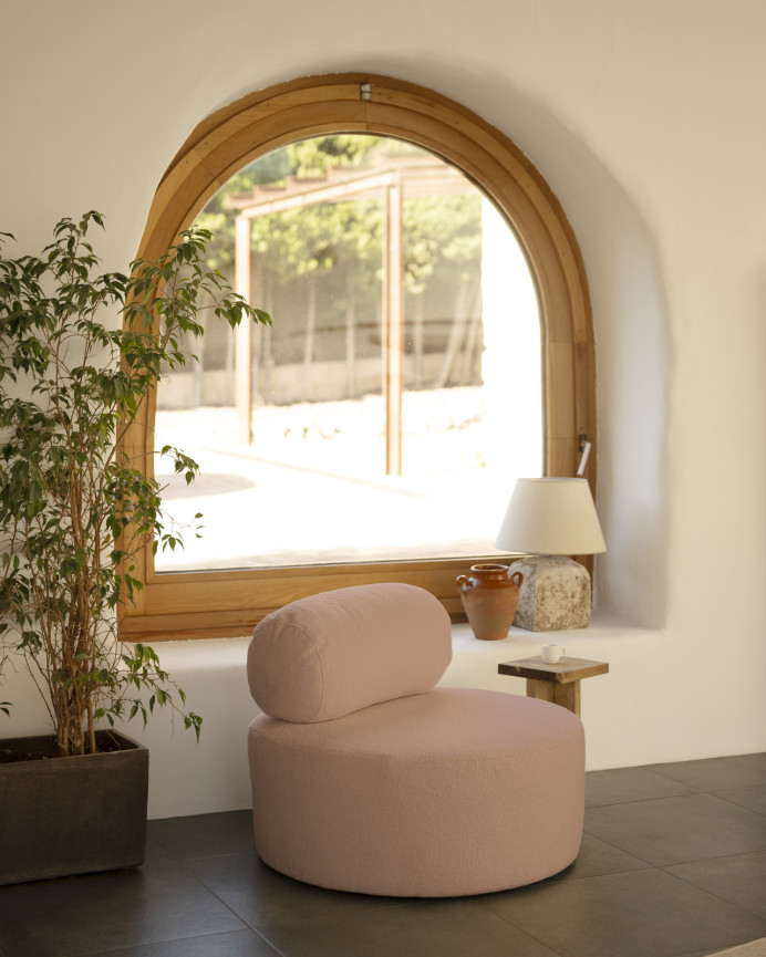 Round pink boucle armchair measuring 91x71cm.
