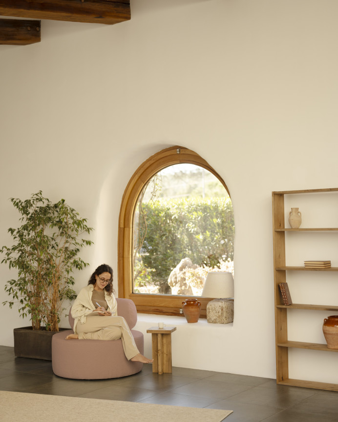 Round pink boucle armchair measuring 91x71cm.