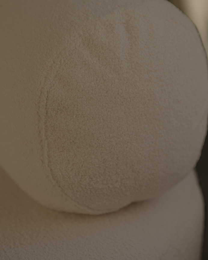 Round brown bouclé armchair measuring 91x71cm.