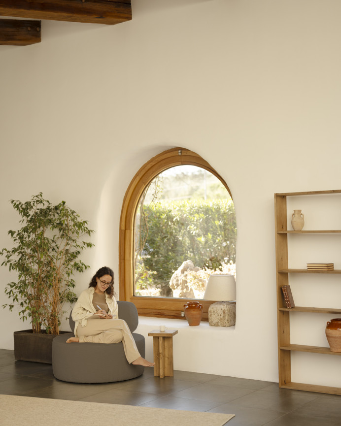 Round brown bouclé armchair measuring 91x71cm.