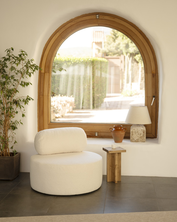 Round white boucle armchair measuring 91x71cm.