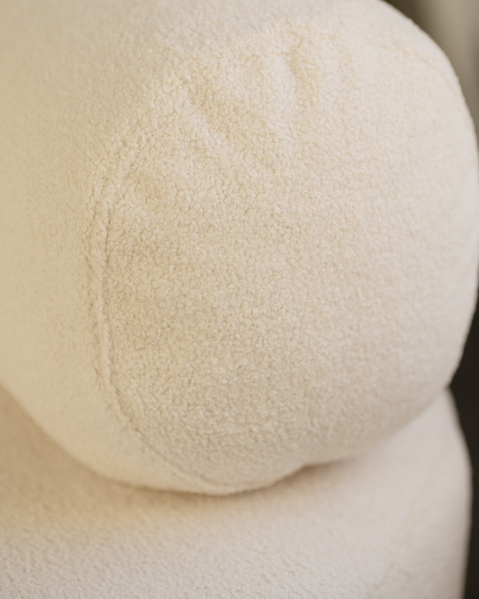 Round white boucle armchair measuring 91x71cm.