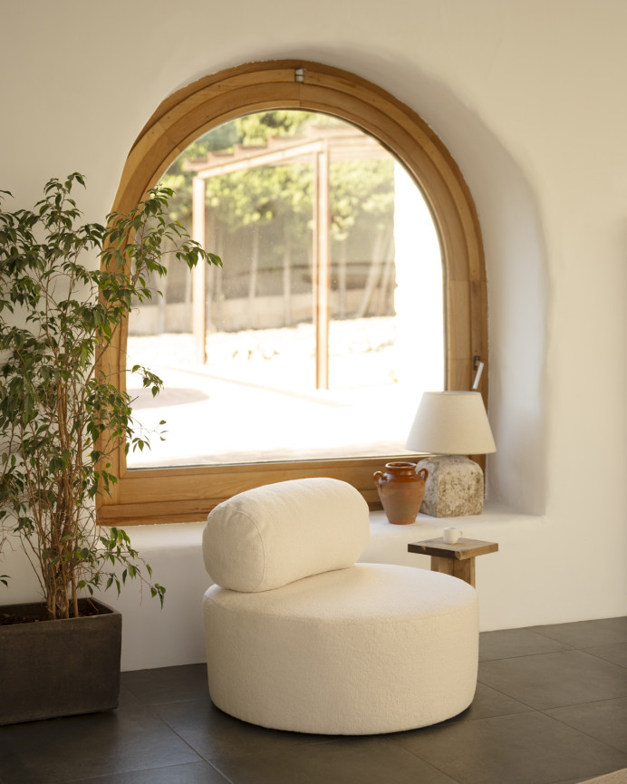 Round white boucle armchair measuring 91x71cm.