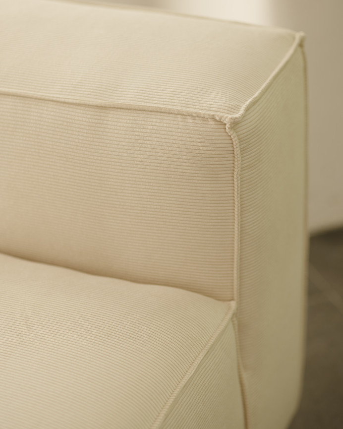 White corduroy armchair measuring 110x90cm