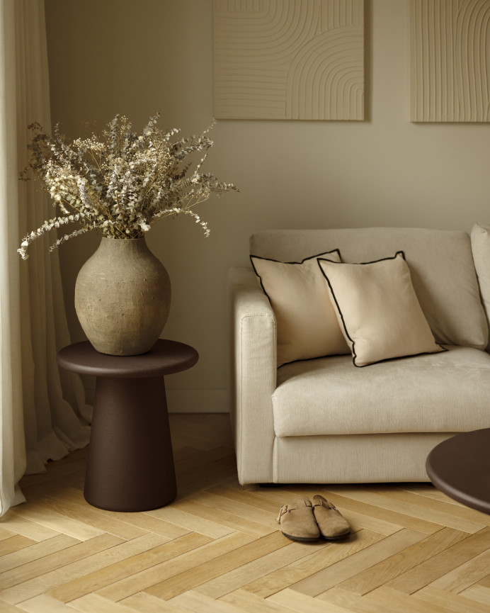 Round brown microcement side table measuring 45x50cm