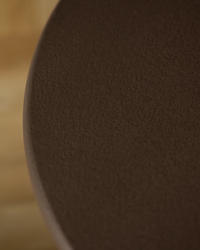 Round brown microcement side table measuring 45x50cm