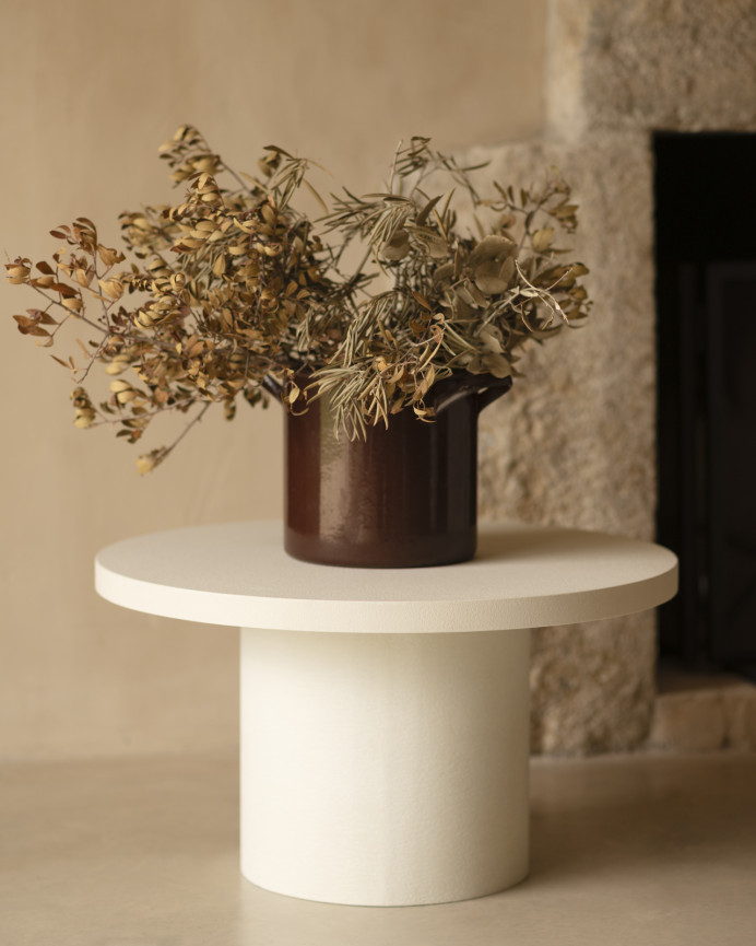 Round microcement coffee table in off-white color available in various sizes
