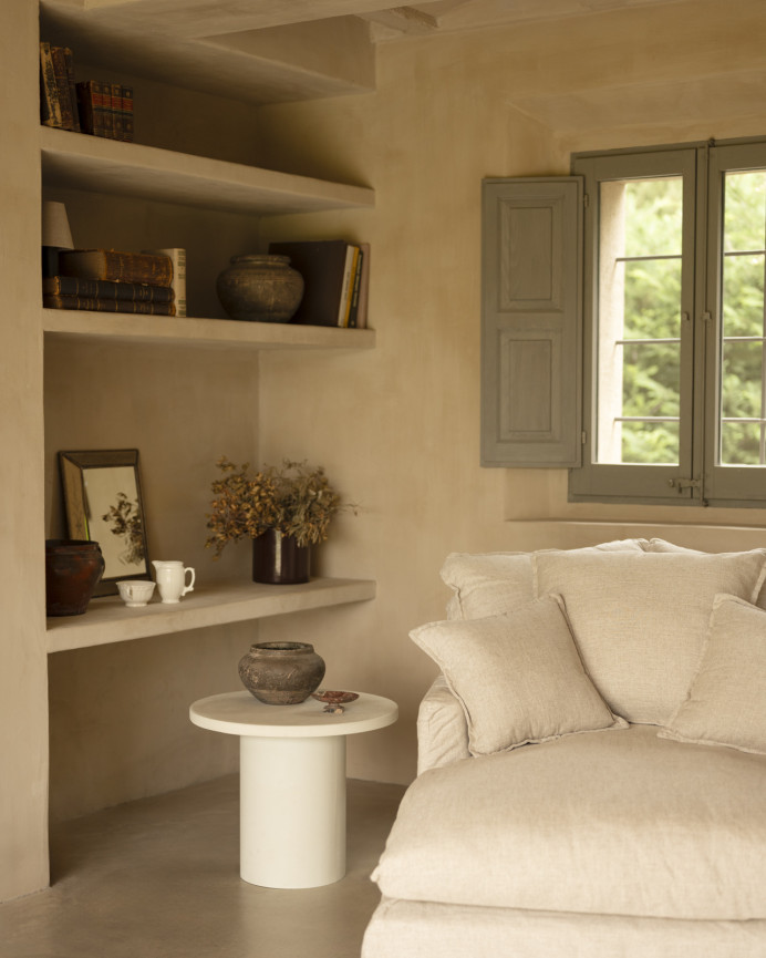 Round microcement coffee table in off-white color available in various sizes