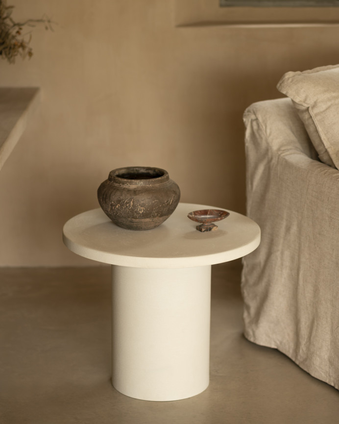 Round microcement coffee table in off-white color available in various sizes