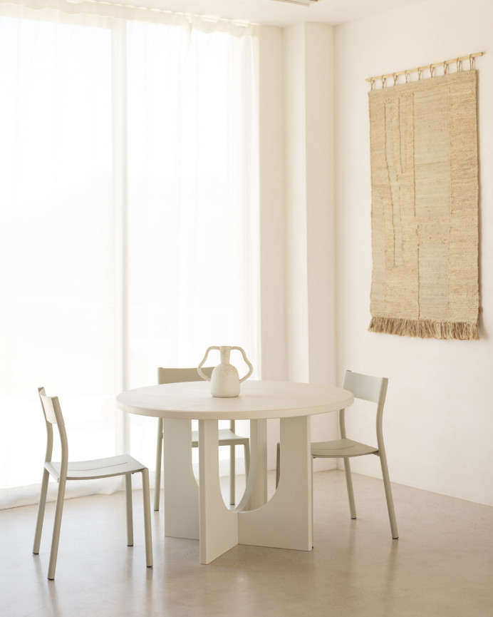 Round dining table made of microcement in various sizes