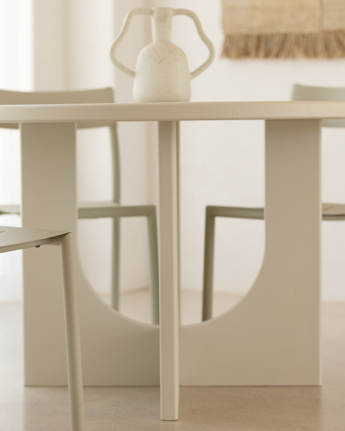 Round dining table made of microcement in various sizes