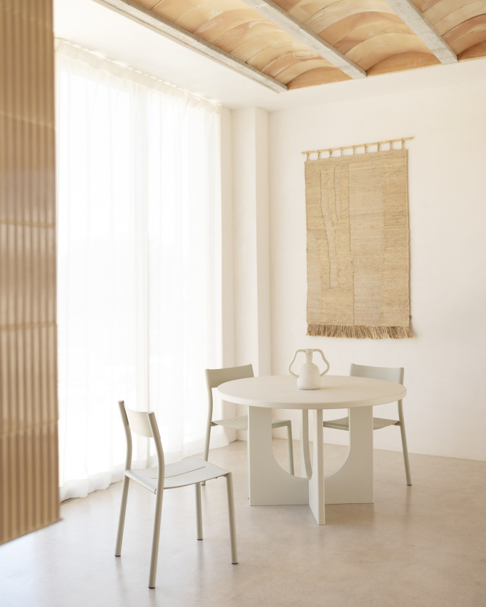 Round dining table made of microcement in various sizes