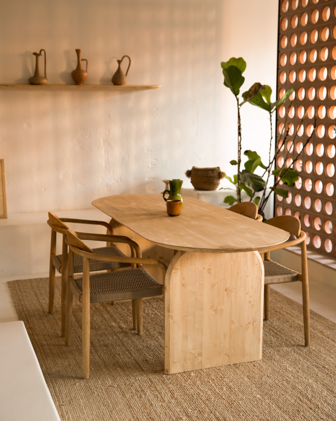 Oval solid wood dining table in medium oak tone in various sizes.