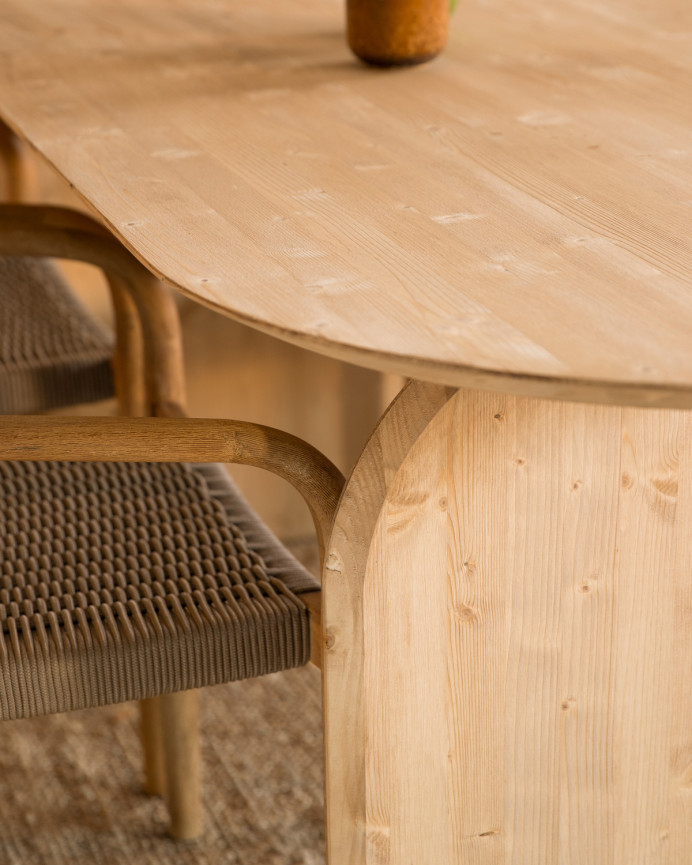 Oval solid wood dining table in medium oak tone in various sizes.