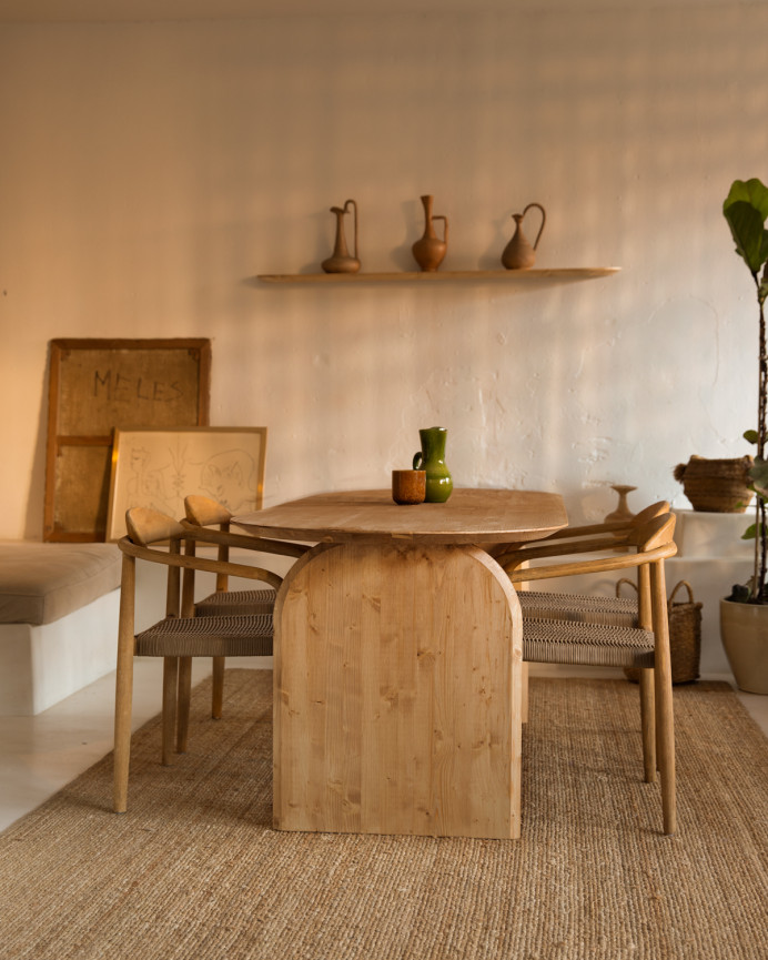 Oval solid wood dining table in medium oak tone in various sizes.