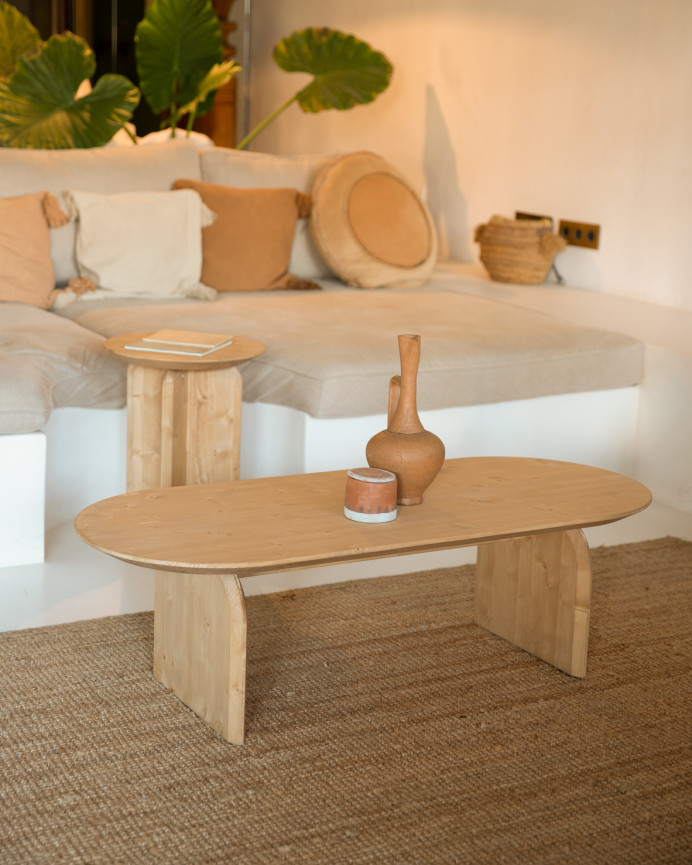 Oval solid wood coffee table in medium oak tone of various sizes