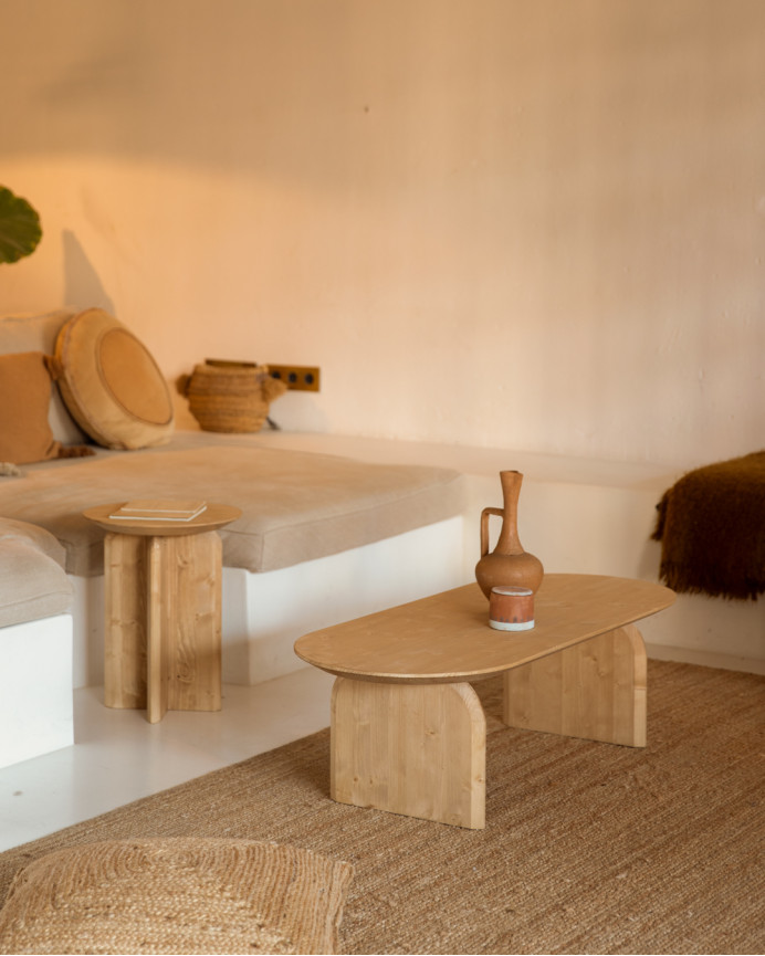 Oval solid wood coffee table in medium oak tone of various sizes